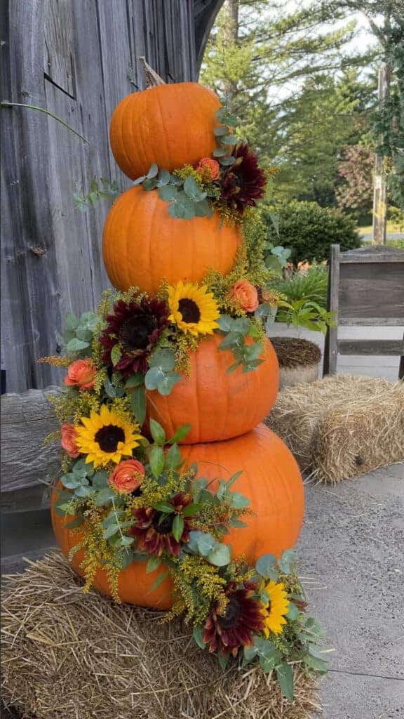 Stacked Pumpkin Tower With Sunflower Garland