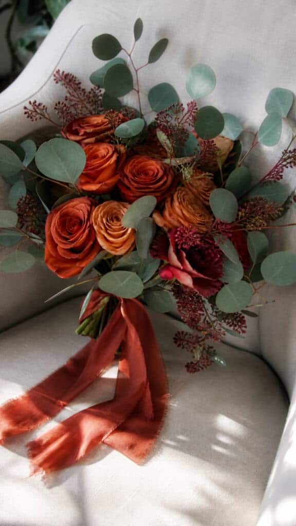 Rust-Colored Roses With Eucalyptus