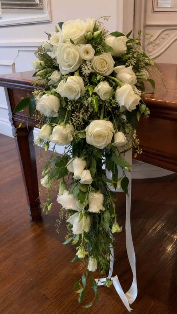 Cascading White Rose Arrangements