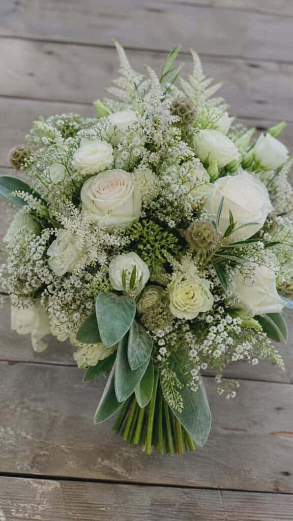 Textured White Rose Bouquets With Unique Elements