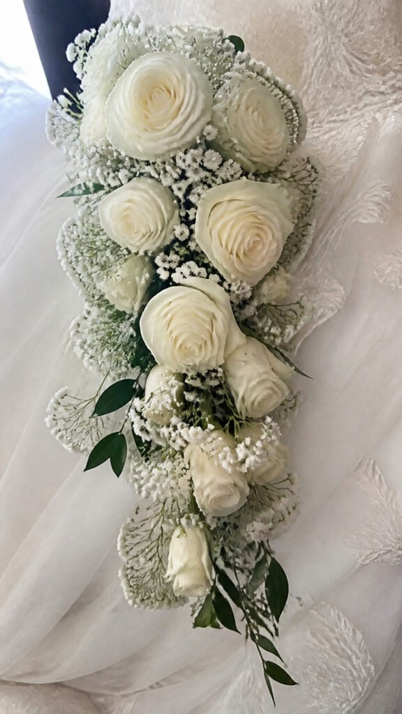 Cascading White Bouquets With Baby Breath