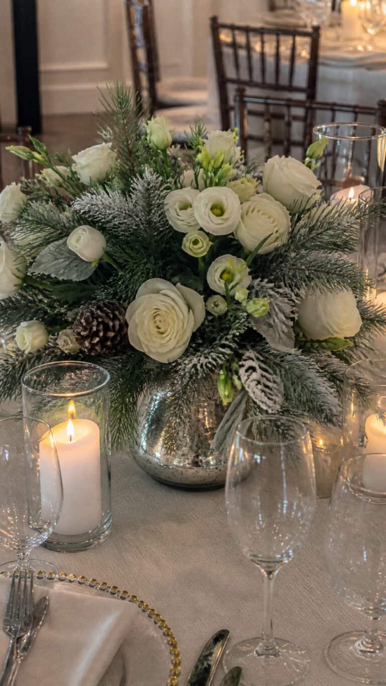 Frosted Evergreen and White Rose Arrangements