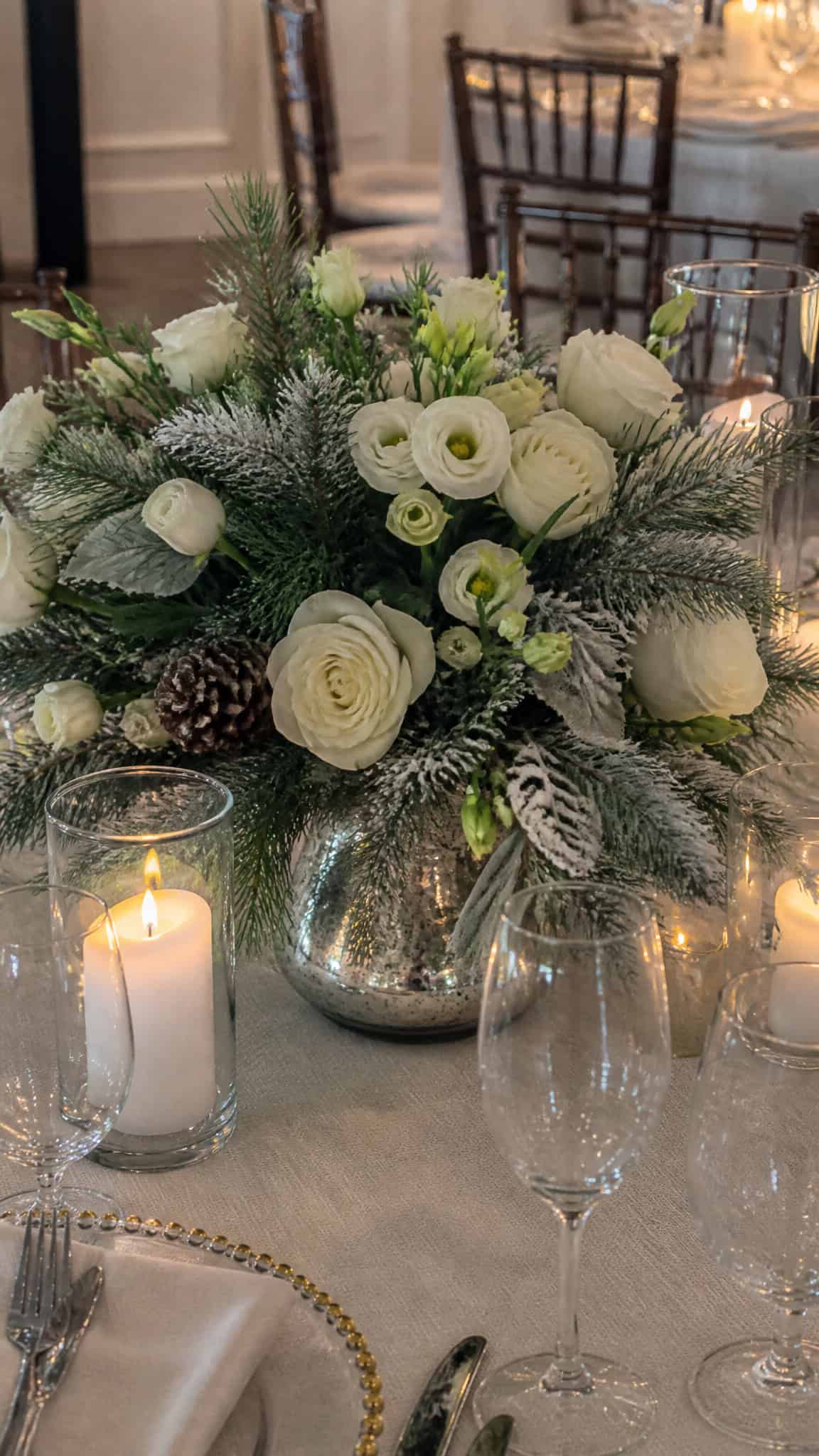 Frosted Evergreen and White Rose Arrangements