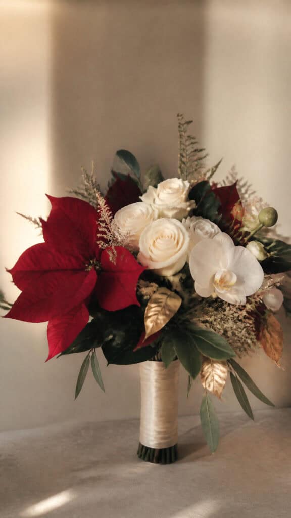 Elegant Poinsettia and Rose Combination