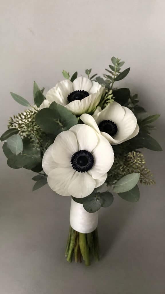 Snowy White Anemones with Black Centers