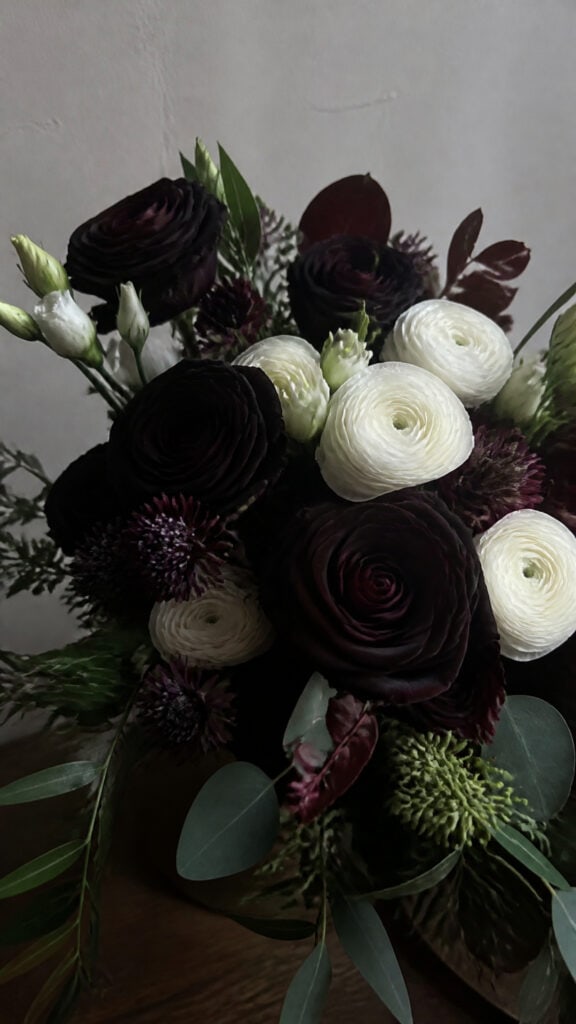 Dramatic Black Baccara Roses with White Blooms